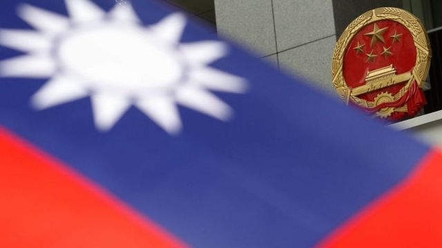 A Taiwan flag being displayed by a protester at the plaza in the new Central Government Office in Admiralty while protesters protest against the government appointed Secretary for Consitutional and Mailand Affairs Stephen Lam Sui-lung as the Chief Secretary. 09OCT11