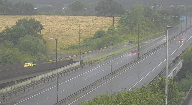 Wet conditions on the M4 at Llandarcy, Neath Port Talbot