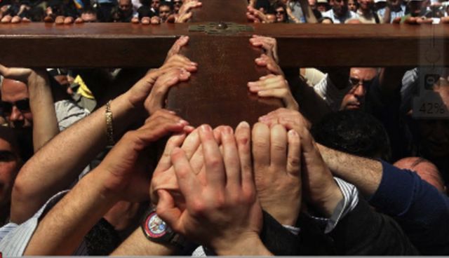 Christians taking part in a Good Friday procession in Jerusalem