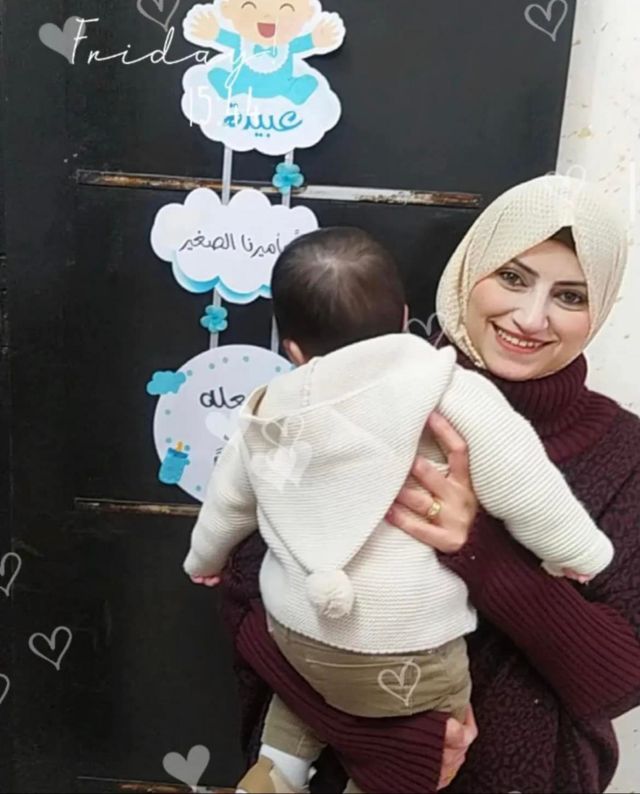 Journalist Doaa Sharaf with her child