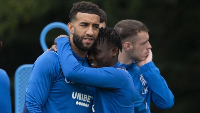Rangers' Connor Goldson and Rabbi Matondo embrace during training