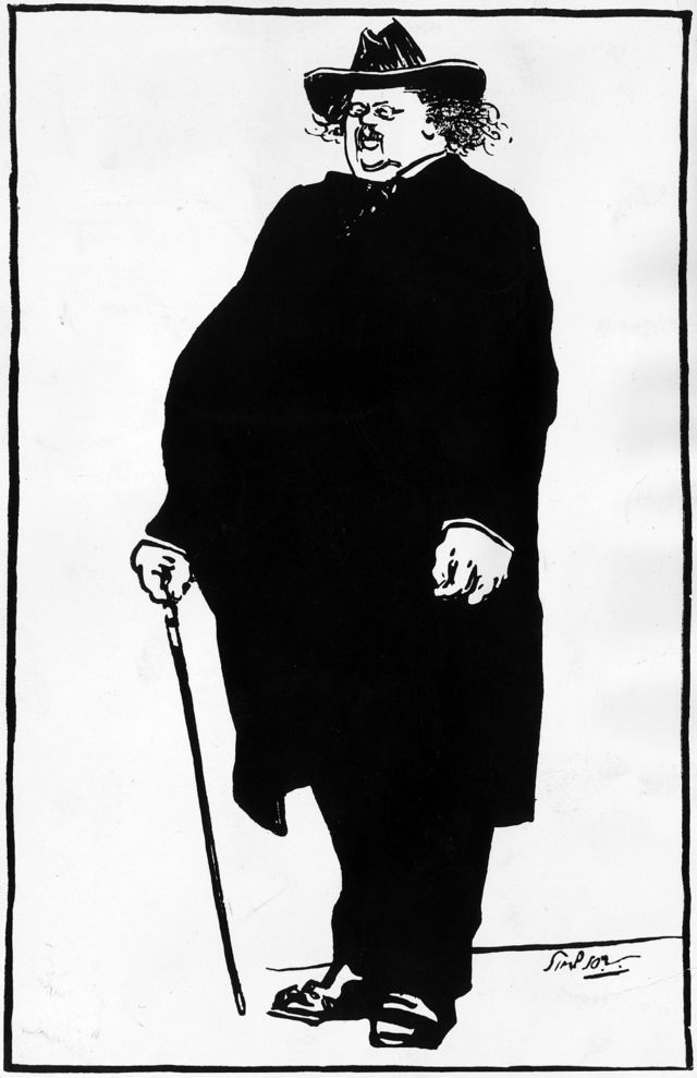 Chesterton com seu traje habitual de chapéu de abas largas, capa e pincenê