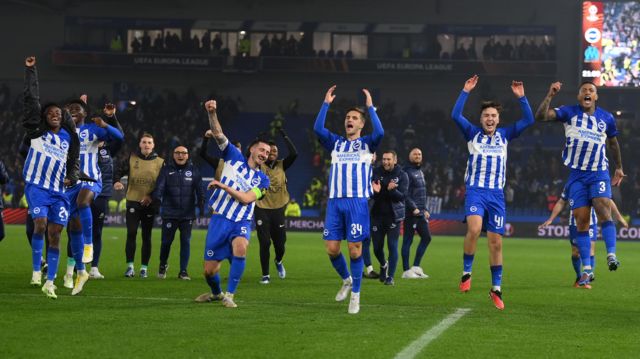 Brighton players celebrate a Europa League victory