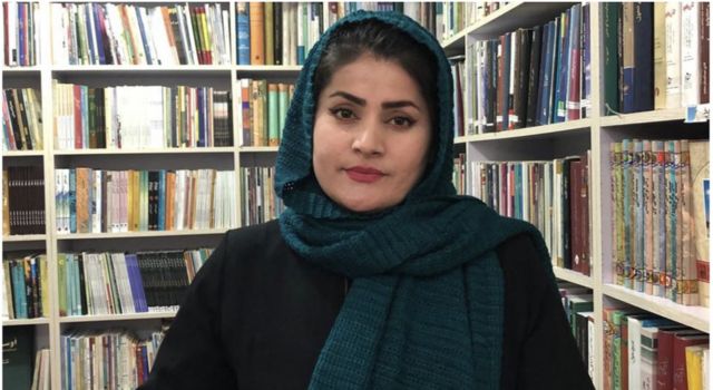 Laila Basim (photo taken in her library in November 2022)