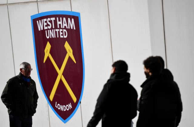 General View of West Ham badge and fans outside the London Stadium