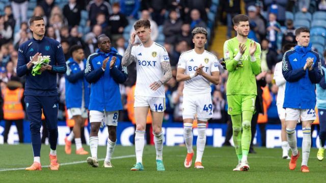 Leeds players applaud their fans after the final day defeat at home to Southampton