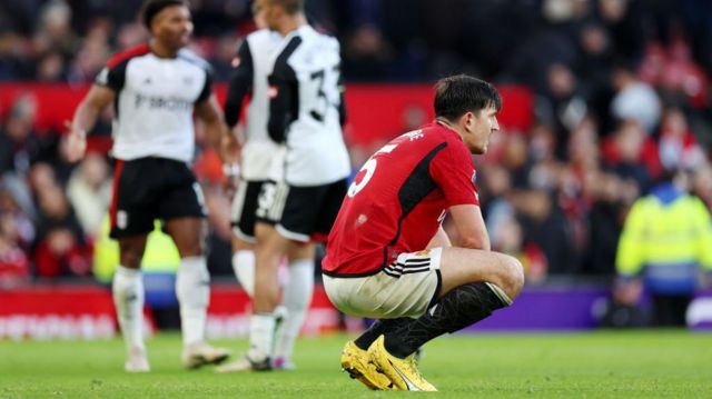 Harry Maguire of Manchester United looks dejected