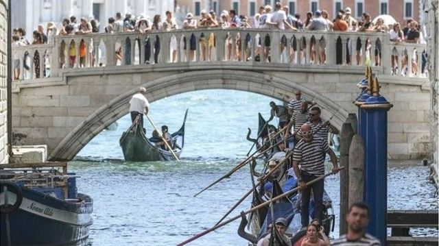 Gondoliers in Venice