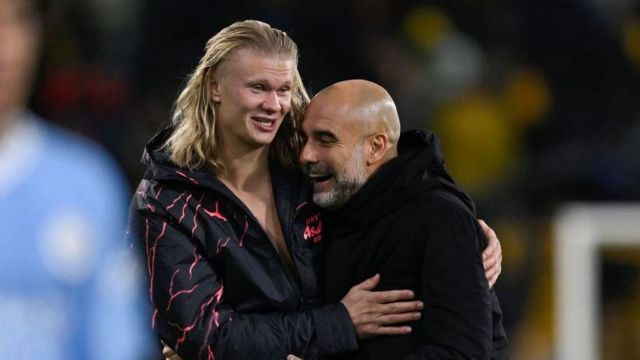 Erling Haaland and Pep Guardiola post-match hug