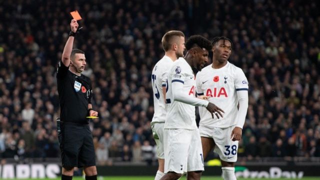 Destiny Udogie receives a red card against Chelsea