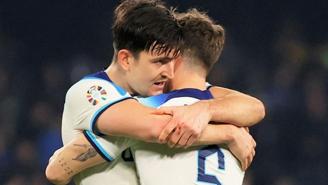 Harry Maguire embraces John Stones