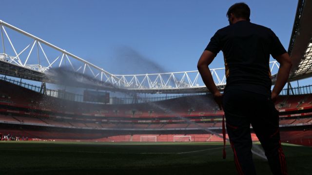 Arsenal pitch being watered
