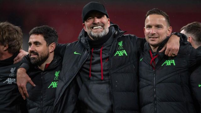 Liverpool manager Jurgen Klopp celebrates with his coaching staff