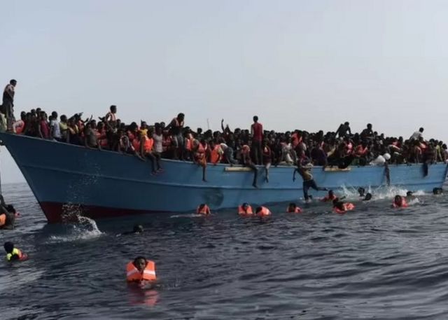 Migrants on a boat in the Mediterranean