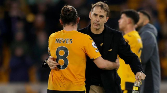Julen Lopetegui hugs Ruben Neves while manager of Wolves