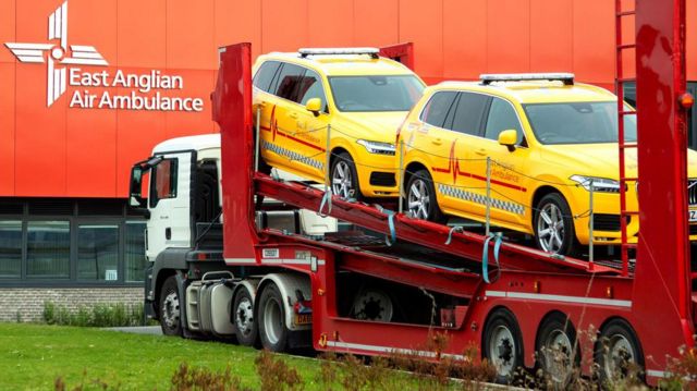 Two rapid response vehicles on the back of a lorry