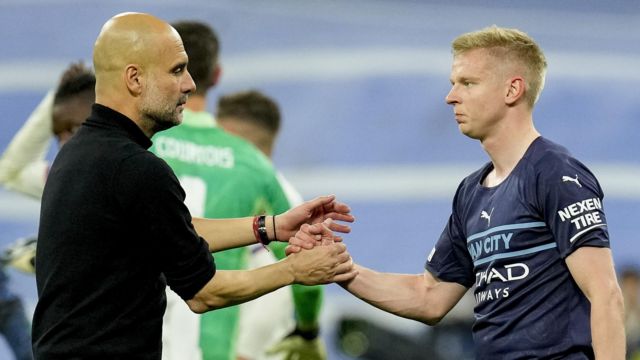 Pep Guardiola and Oleksandr Zinchenko