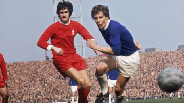 Larry Lloyd playing for Liverpool against Everton