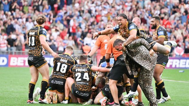 Leigh celebrate their golden point Challenge Cup final win in 2023