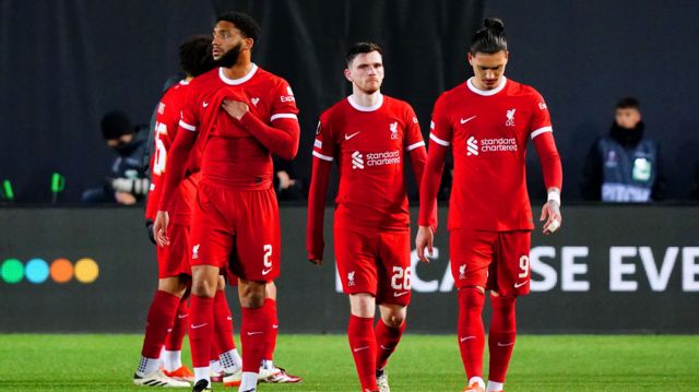 Liverpool players looking disappointed after being knocked out of the Europa League by Atalanta