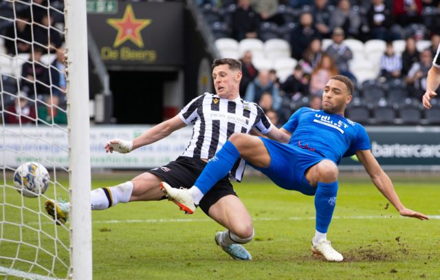 St Mirren's James Bolton scores an own goal after diverting Rangers' Mohamed Diomande's header into the net to make it 1-0 during a cinch Premiership match between St Mirren and Rangers at SMiSA Stadium, on April 28, 2024, in Paisley, Scotland.