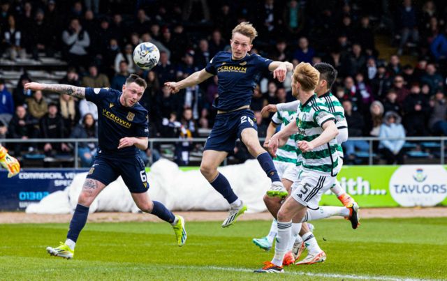 Dundee's Michael Mellon has a shot off target during a cinch Premiership match between Dundee and Celtic at Scot Foam Stadium at Dens Park, on April 28, 2024, in Dundee, Scotland.
