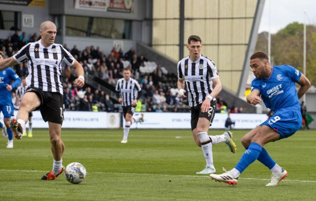 Rangers' Cyriel Dessers has a shot during a cinch Premiership match between St Mirren and Rangers at SMiSA Stadium, on April 28, 2024, in Paisley, Scotland.