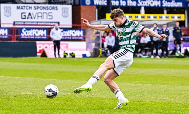 Celtic's James Forrest scores his second goal of the game to make it 2-0 during a cinch Premiership match between Dundee and Celtic at Scot Foam Stadium at Dens Park, on April 28, 2024, in Dundee, Scotland.