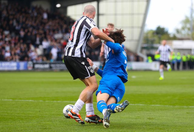 Rangers' Fabio Silva collides with St Mirren's Alex Gogic in the box during a cinch Premiership match between St Mirren and Rangers at SMiSA Stadium, on April 28, 2024, in Paisley, Scotland.