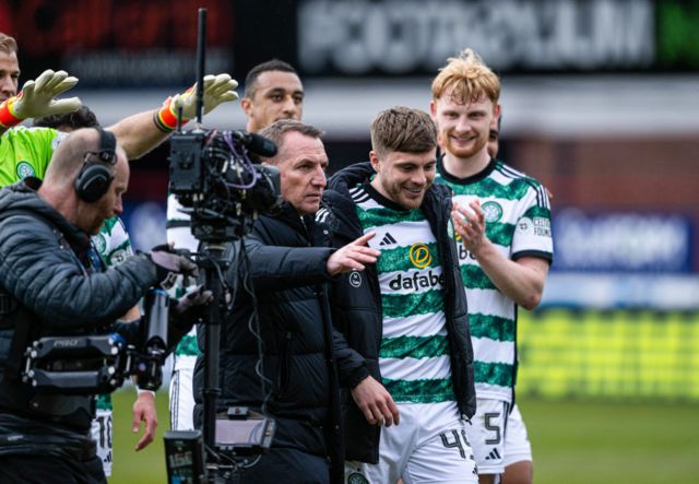 Celtic manager Brendan Rodgers and James Forrest at full time during a cinch Premiership match between Dundee and Celtic at Scot Foam Stadium at Dens Park, on April 28, 2024, in Dundee, Scotland.