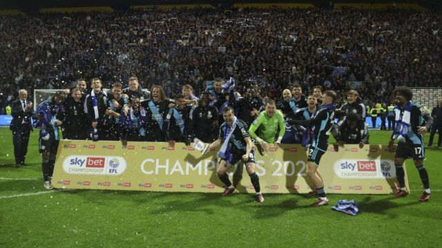 Leicester celebrate winning the Championship