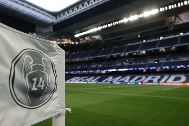 The corner flag at the Bernabeu showing Real Madrid's 14 Champions League wins