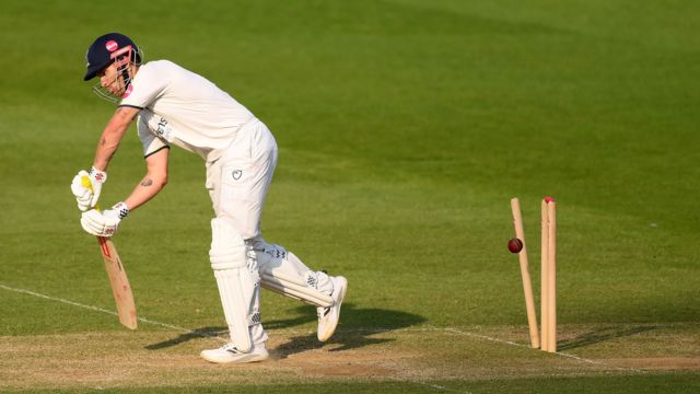 Sam Hain bowled by Kemar Roach