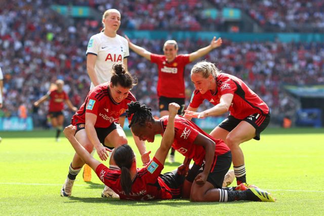 Lucia Gracia, Melvine Malard and Millie Turner of Manchester United celebrate their 2nd goal with goalscorer Rachel Williams during the Adobe Women's FA Cup Final match between Manchester United and Tottenham Hotspur
