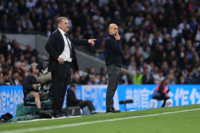 Pep and Ange stand thoughtfully in their technical areas
