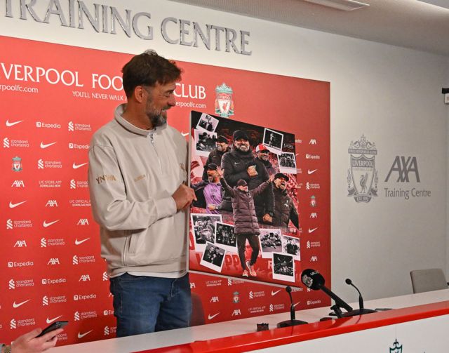 Jurgen Klopp is given a montage from the press at his final press conference