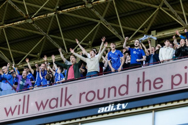 St Johnstone fans celebrate after a cinch Premiership match between Motherwell and St Johnstone at Fir Park, on May 19, 2024, in Motherwell, Scotland.