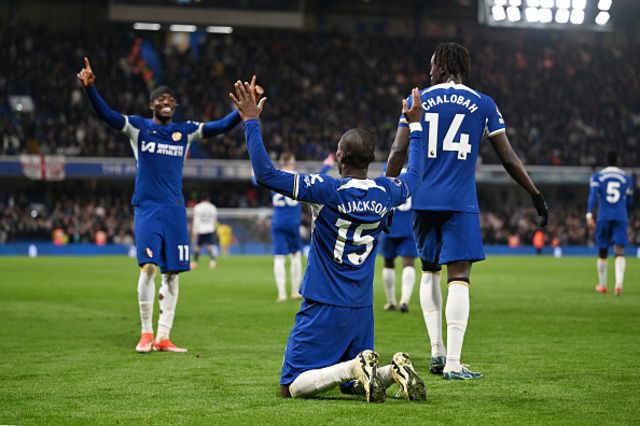 : Nicolas Jackson of Chelsea celebrates scoring his team's second goal with teammates Noni Madueke and Trevoh Chalobah during the Premier League match between Chelsea FC and Tottenham Hotspur