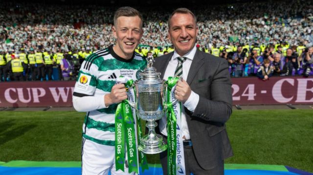 Celtic manager Brendan Rodgers and Callum McGregor with the Scottish Cup during a Scottish Gas Scottish Cup final match between Celtic and Rangers at Hampden Park, on May 25, 2024, in Glasgow, Scotland.