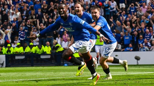 Rangers' Abdallah Sima celebrates after scoring to make it 1-0 before it is ruled out following a VAR review for a foul by Rangers' Nicolas Raskin on Celtic's Joe Hart during a Scottish Gas Scottish Cup final match between Celtic and Rangers at Hampden Park, on May 25, 2024, in Glasgow, Scotland.