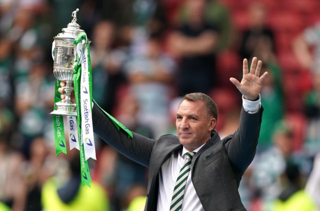 Brendan Rodgers celebrates with the Scottish Cup