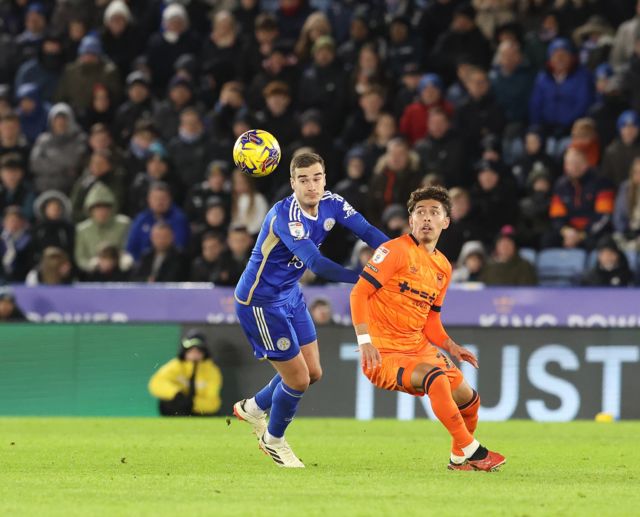 Leicester City's Harry Winks battles with Ipswich Town's Jeremy Sarmiento