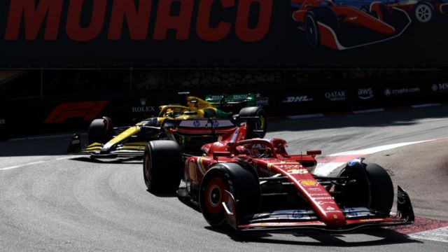 charles leclerc leading from oscar piastri