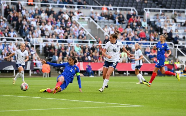 England's Ella Toone drags an effort wide against France