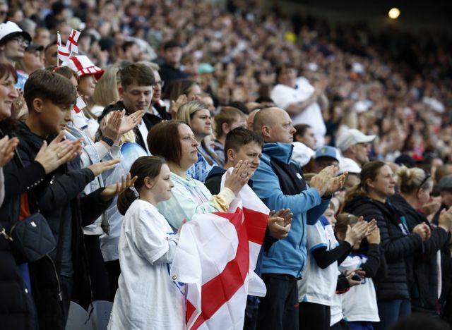 General view as England fans applaud on the 10th minute in memory of 10 year old Leah Harrison