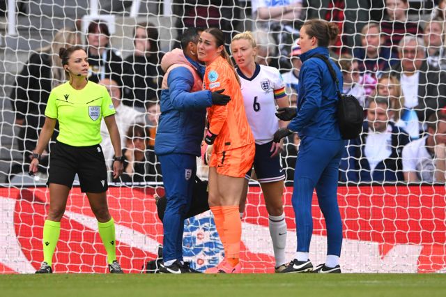 Mary Earps of England receives medical treatment during the UEFA Women's EURO 2025 qualifying match between England and France at St James' Park