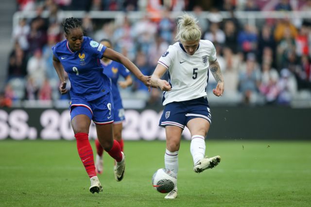 England's Millie Bright (right) and France's Marie-Antoinette Katoto battle for the ball during the UEFA Women's Euro 2025 qualifying League A, Group A3 match at St. James' Park, Newcastle upon Tyne