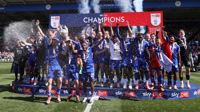 Leicester City players lift the Championship trophy