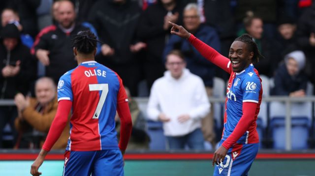 Michael Olise and Eberechi Eze celebrate a Crystal Palace goal