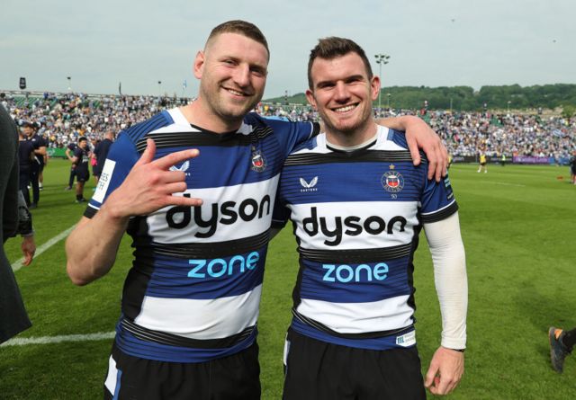 Finn Russell and Ben Spencer celebrate Bath's win over Sale